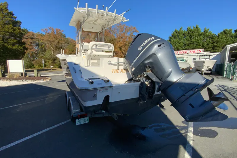 Slide: The Image of 2011 Sea Fox 256 Center Console boat with Yamaha outboard motor on trailer. - 8