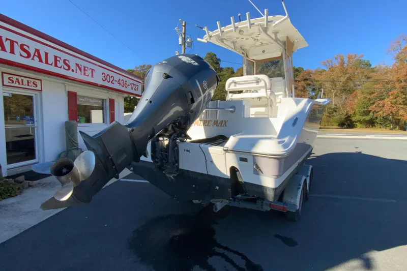 Slide: The Image of 2011 Sea Fox 256 Center Console boat on trailer, parked outside sales office. - 9