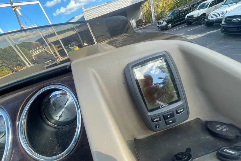 Slide: The Image of Dashboard of a 2013 Bennington R22 boat with Garmin GPS and gauge. - 14