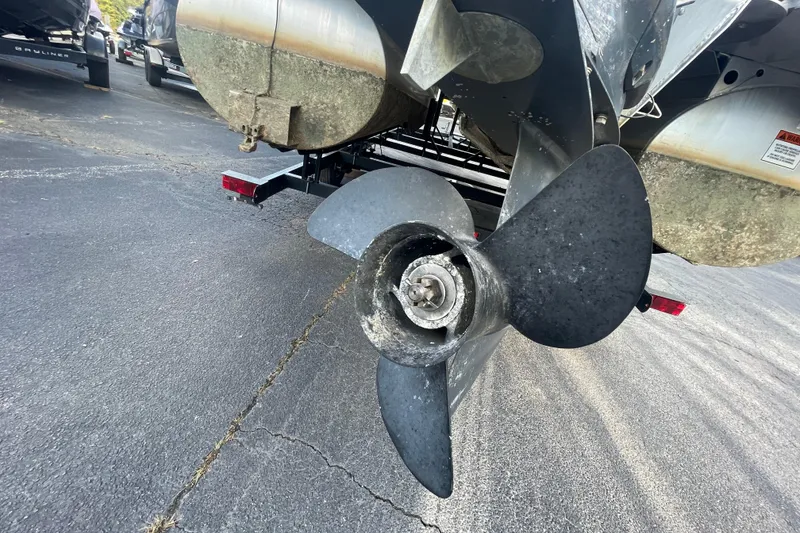 Slide: The Image of 2013 Bennington R22 boat propeller and pontoons on a trailer. - 16
