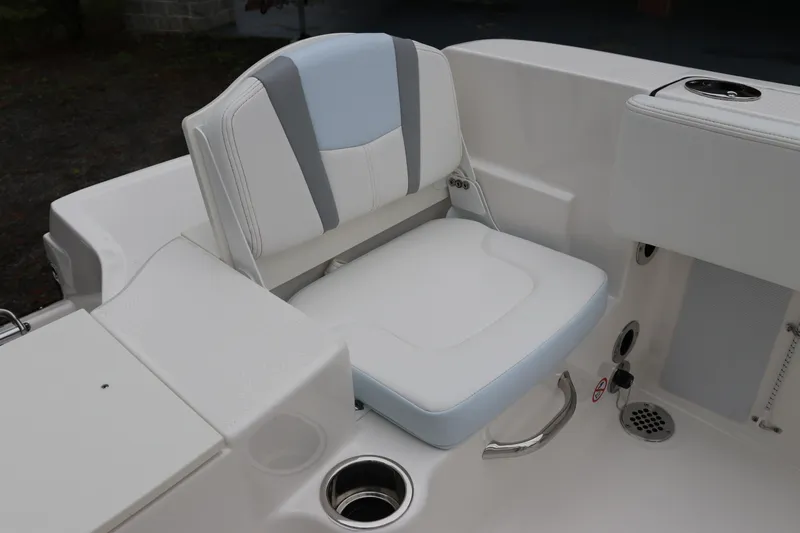 Slide: The Image of 2026 Robalo R180 Center Console boat seat with cup holder and sleek design. - 14