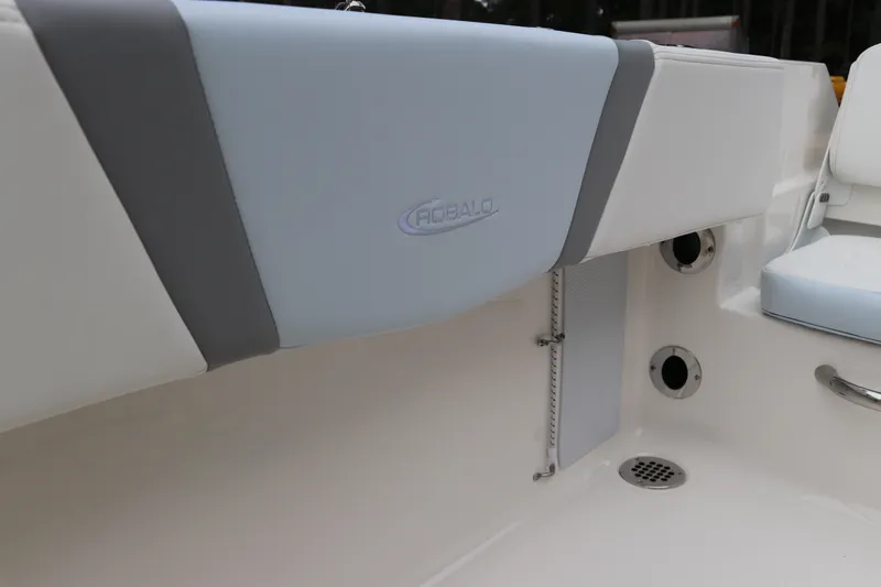 Slide: The Image of 2026 Robalo R180 Center Console boat interior with sleek seating and modern design. - 18