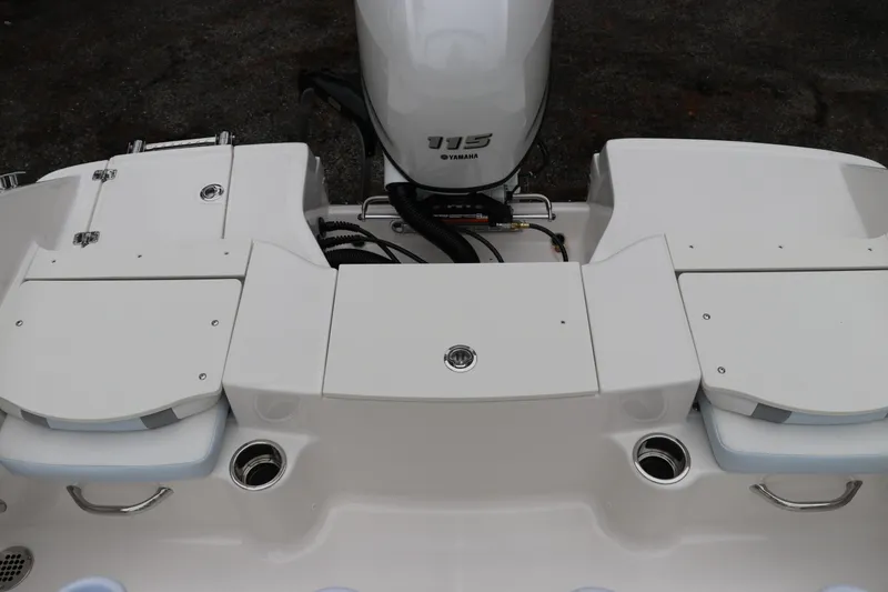 Slide: The Image of 2026 Robalo R180 Center Console boat with Yamaha 115 engine, featuring sleek white design. - 9