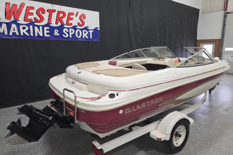 Slide: The Image of 1996 Glastron SX175 boat on trailer at Westre's Marine & Sport showroom. - 1