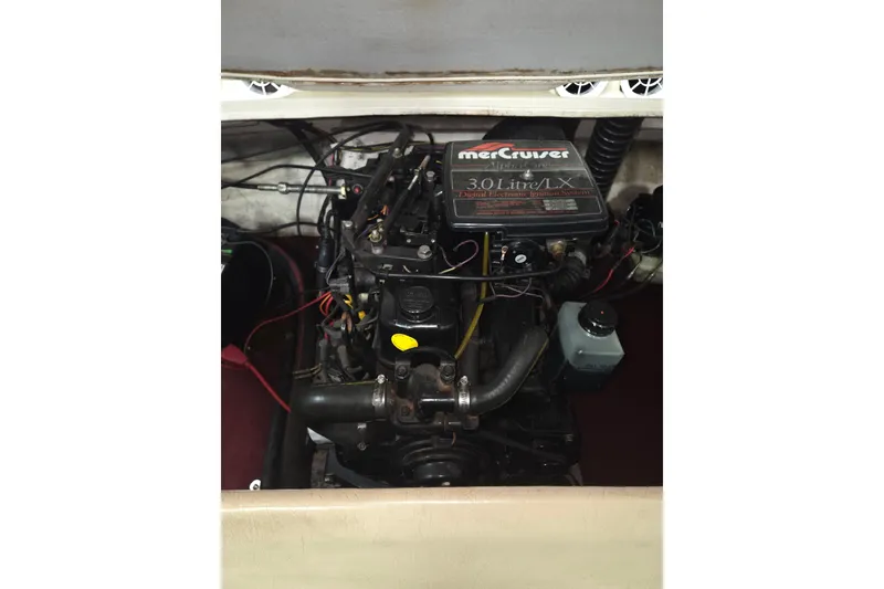 Slide: The Image of Engine compartment of a 1996 Glastron SX175 boat with MerCruiser 3.0L engine. - 8