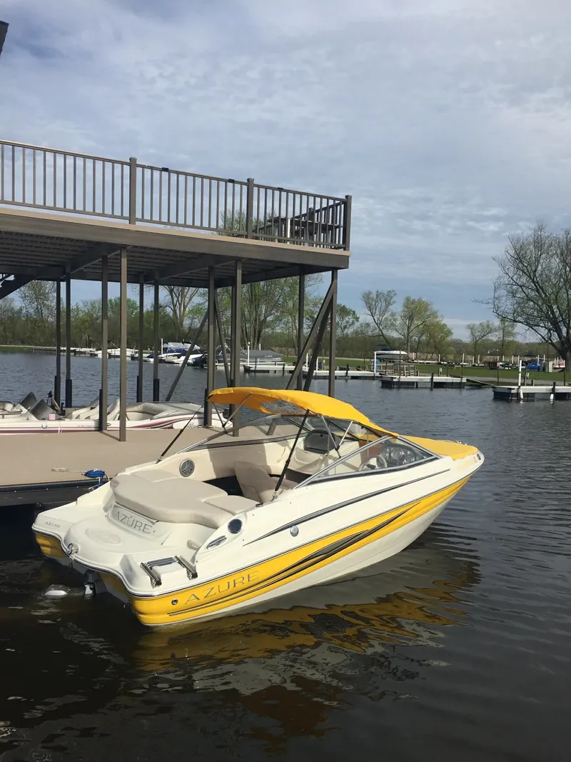 The Image of 2007 Azure AZ 188 boat docked with yellow canopy. - 0