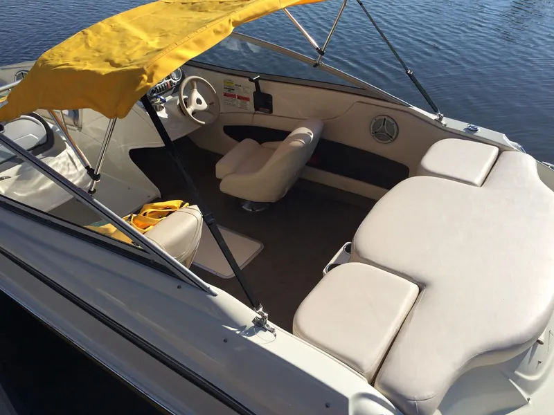 Slide: The Image of Interior of a 2007 Azure AZ 188 boat with yellow sunshade. - 2