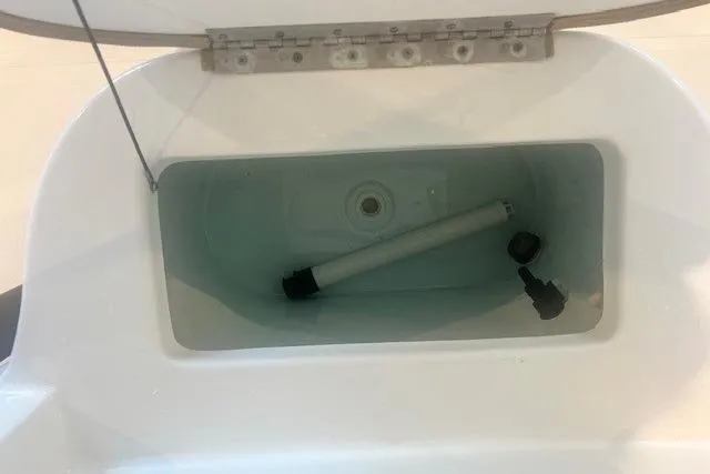 Slide: The Image of Open storage compartment in 2017 Sea Hunt BX 25 BR boat. - 10