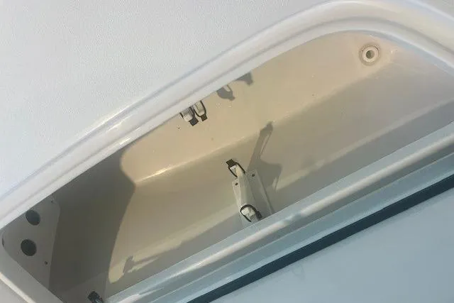 Slide: The Image of Storage compartment of 2017 Sea Hunt BX 25 BR boat, open and empty. - 18