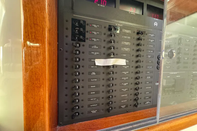 Slide: The Image of Control panel of a 2001 Hinckley Talaria 44 yacht with wooden trim. - 41