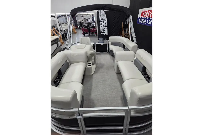 Slide: The Image of 2023 SunChaser Vista 16 LR with Yamaha 40 HP outboard motor, displayed indoors. - 3
