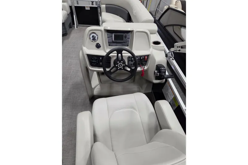 Slide: The Image of 2023 SunChaser Vista 16 LR boat interior with plush seating and cup holders. - 6