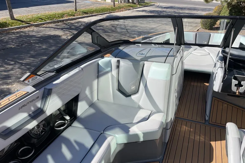 Slide: The Image of 2020 Nautique Super Air Nautique G25 interior with sleek seating and modern design. - 10