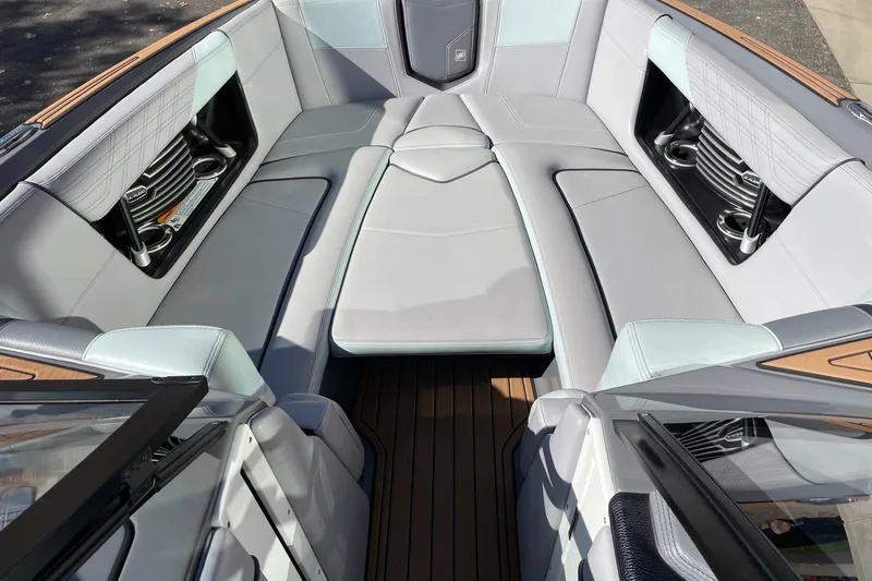 Slide: The Image of 2020 Nautique Super Air Nautique G25 interior with luxurious seating and modern design. - 11