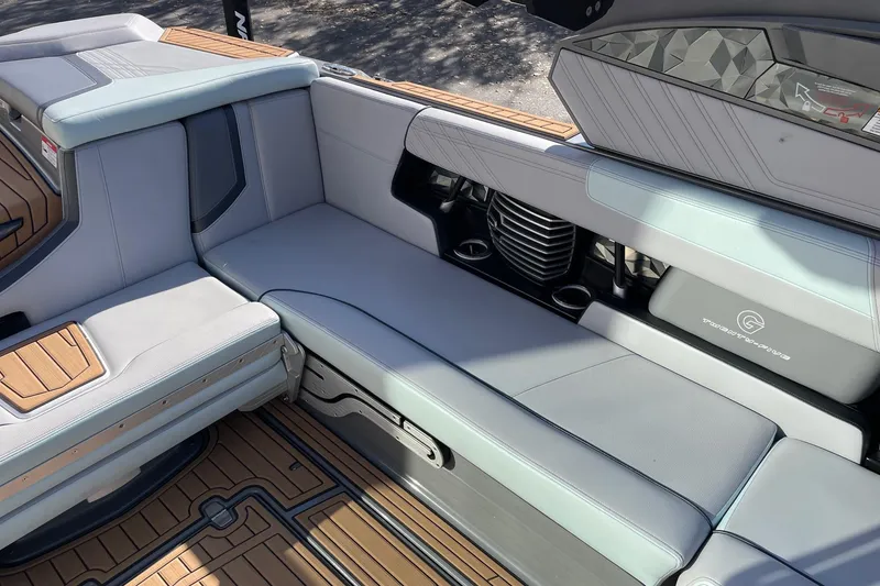 Slide: The Image of 2020 Nautique Super Air Nautique G25 interior with sleek seating and modern design. - 9