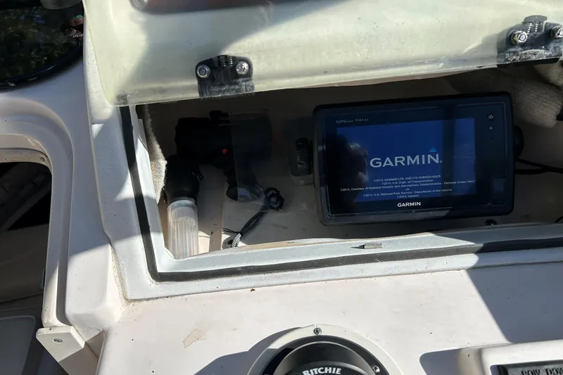 Slide: The Image of Garmin GPS device on 1998 Grady-White Seafarer 226 boat dashboard. - 9