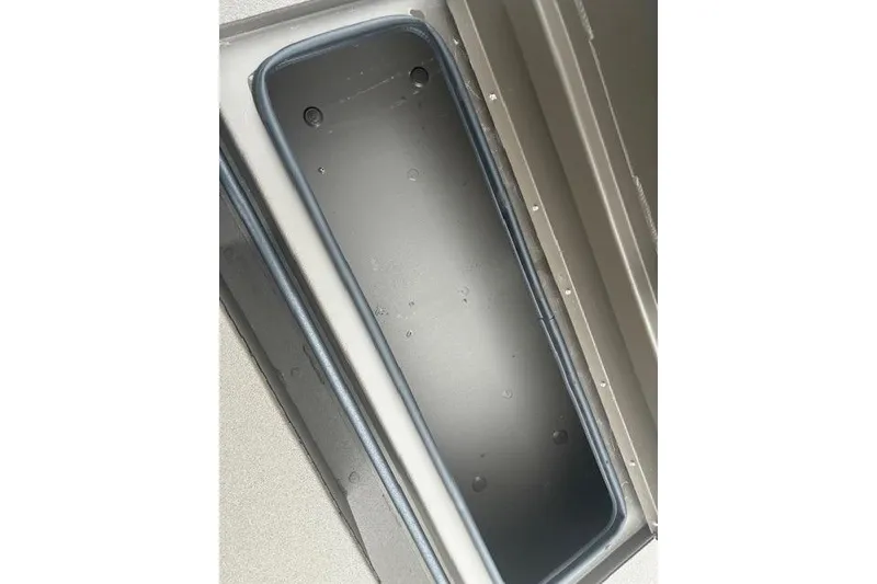 Slide: The Image of 2026 Alweld 1760VV Marsh Console CC storage compartment interior view. - 9