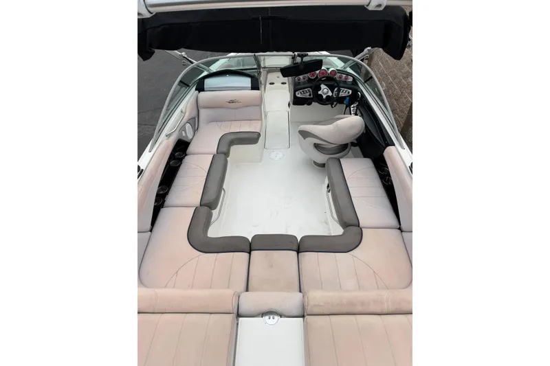 Slide: The Image of 2006 MasterCraft X30 boat interior with spacious seating and modern dashboard. - 6