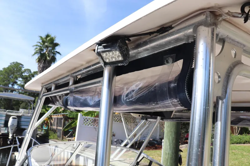 Slide: The Image of 1999 Grady-White Islander 268 boat with T-top and mounted LED light. - 27