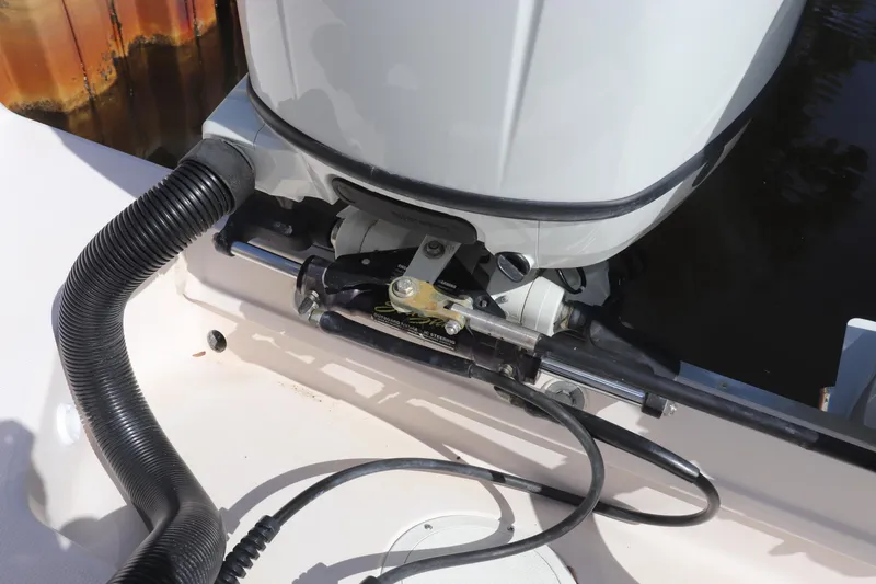 Slide: The Image of 1999 Grady-White Islander 268 boat engine detail with hydraulic steering components. - 9