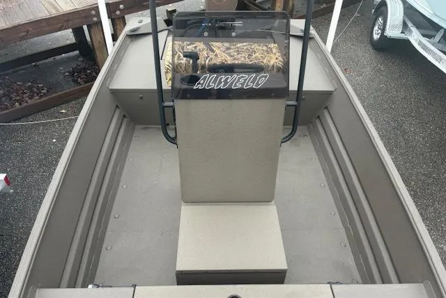 Slide: The Image of 2026 Alweld 1760VV Marsh Console CC boat interior with console and seating. - 11