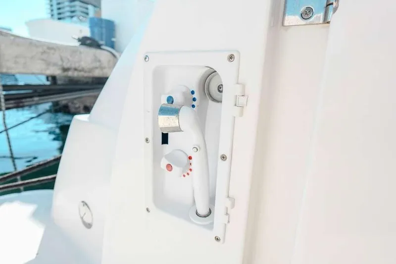 Slide: The Image of 2005 Sea Ray 420 Sedan Bridge shower control panel on deck. - 32