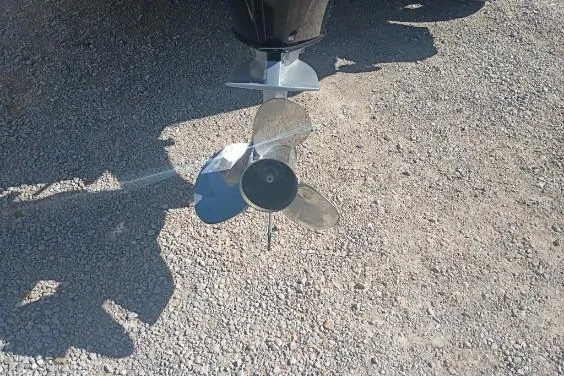 Slide: The Image of 2021 Ranger Z521L boat propeller on gravel surface. - 8