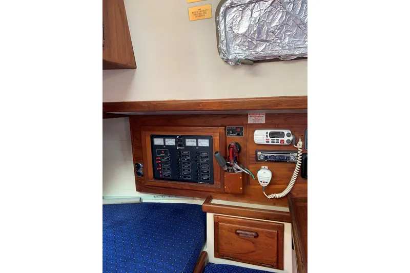 Slide: The Image of Control panel of a 1993 Pacific Seacraft 37 sailboat interior. - 15