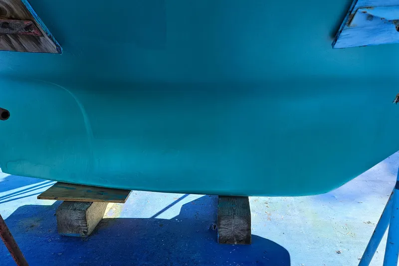 Slide: The Image of Pacific Seacraft 37 sailboat hull, 1993 model, on wooden supports. - 16