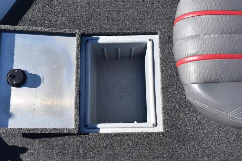 Slide: The Image of 2015 Ranger RT178C boat interior with storage compartment and seat detail. - 16