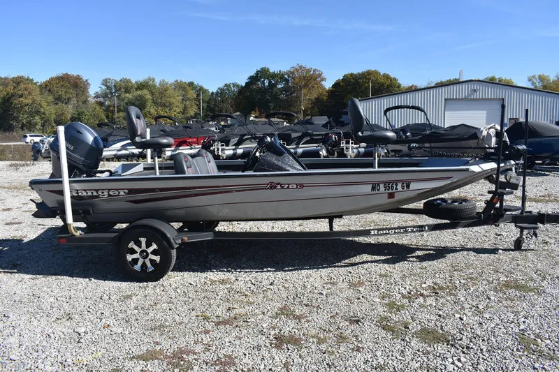 Slide: The Image of 2015 Ranger RT178C fishing boat on trailer, parked outdoors. - 3