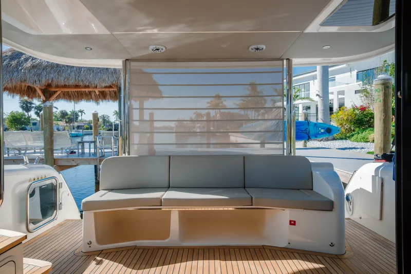 Slide: The Image of Stern view of 2020 Absolute NAVETTA 48 yacht with teak deck and steps. - 12