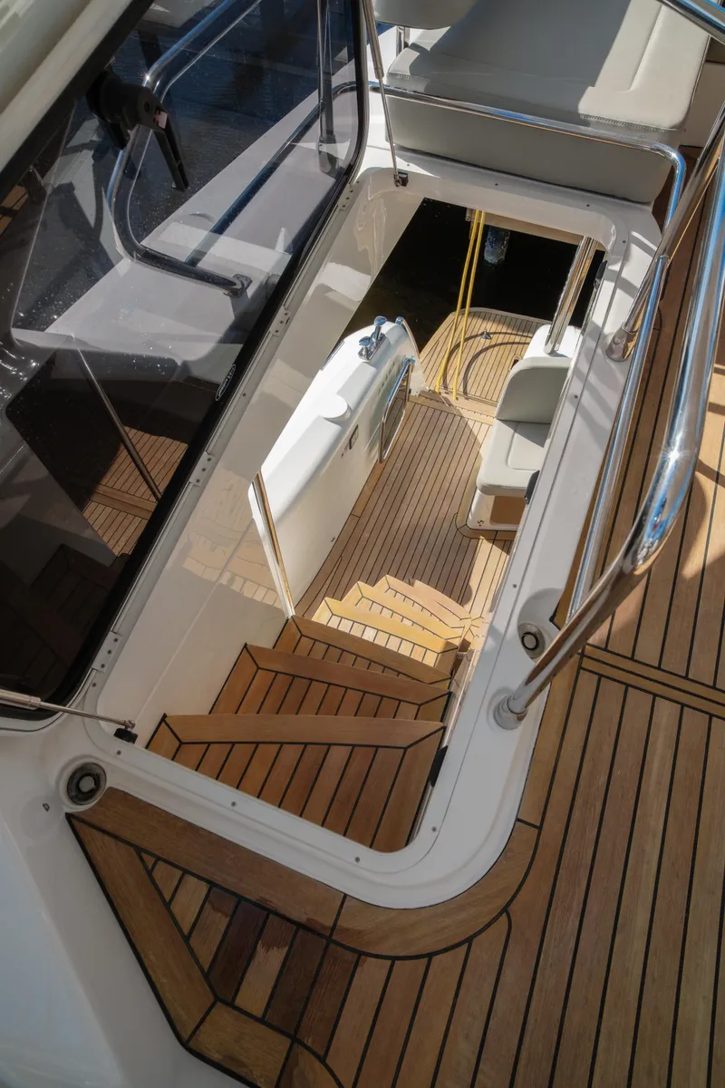 Slide: The Image of Cockpit view of 2020 Absolute NAVETTA 48 yacht overlooking the ocean. - 20