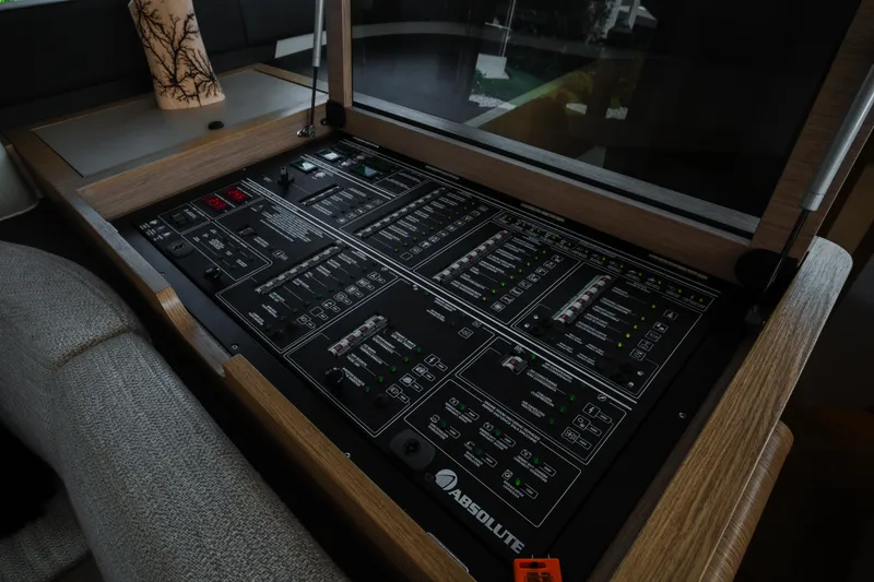 Slide: The Image of 2020 Absolute 48 Navetta yacht deck with seating and wooden flooring. - 30