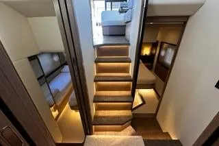 Slide: The Image of Cockpit of 2020 Absolute 48 Navetta yacht with navigation screens and steering wheel. - 32