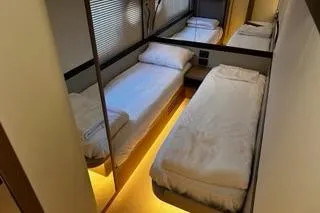 Slide: The Image of Luxurious bathroom interior on 2020 Absolute NAVETTA 48 yacht, featuring modern fixtures and elegant design. - 45