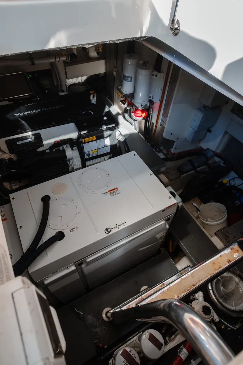 Slide: The Image of Engine room of 2020 Absolute NAVETTA 48 yacht with Volvo Penta components and electrical systems. - 49