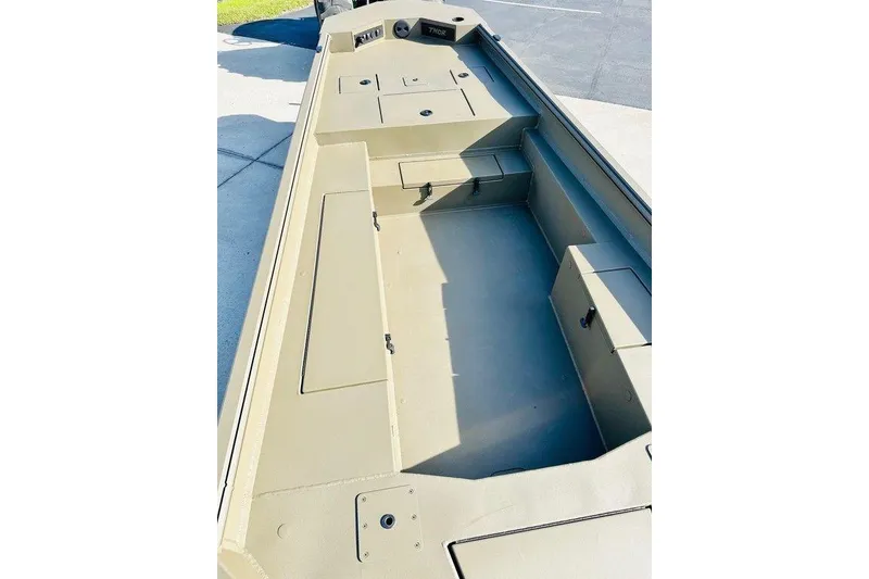 Slide: The Image of 2026 Thor 1754 Fish Hammer boat interior, showcasing spacious storage compartments and seating. - 7