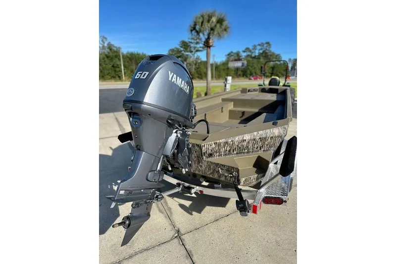 Slide: The Image of 2026 Thor 1754 Fish Hammer boat with Yamaha 60 engine on trailer. - 8