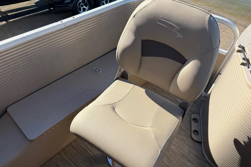 Slide: The Image of Bennington 21SF 2020 boat deck with cup holders and measurement markings. - 101