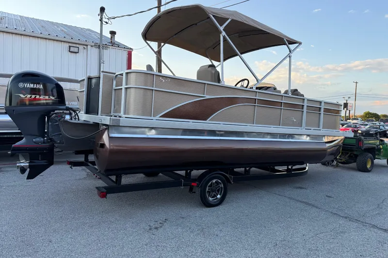 Slide: The Image of 2020 Bennington 21SF pontoon boat with Yamaha VMAX engine on trailer. - 20