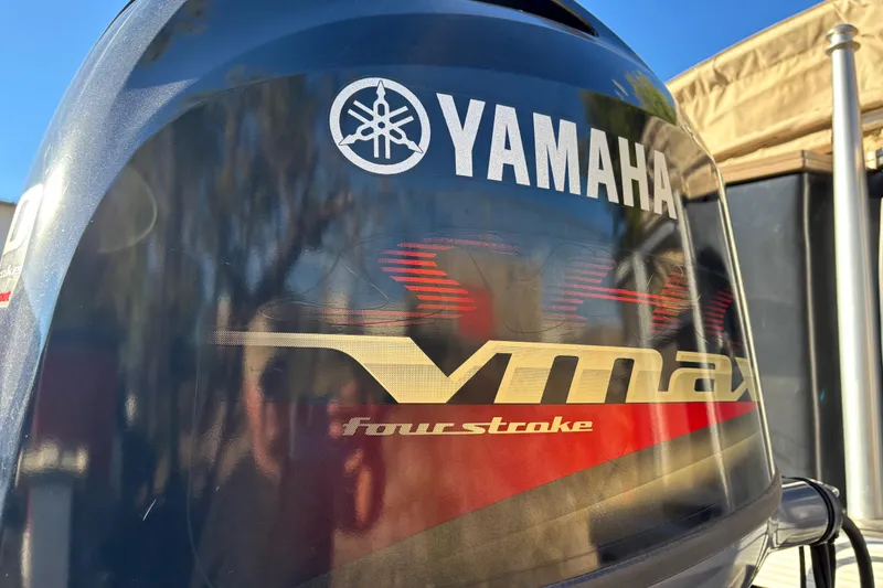 Slide: The Image of 2020 Bennington 21SF pontoon boat with Yamaha VMAX outboard motor on trailer. - 3