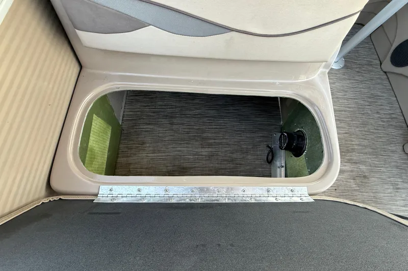 Slide: The Image of 2020 Bennington 21SF boat interior with steering console and seating area. - 37