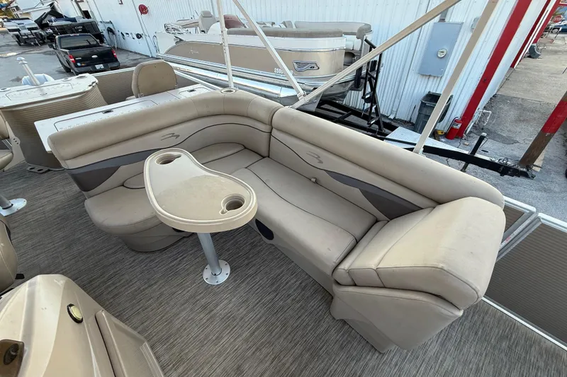 Slide: The Image of Interior view of a 2020 Bennington 21SF boat, showcasing wiring and flooring details. - 39
