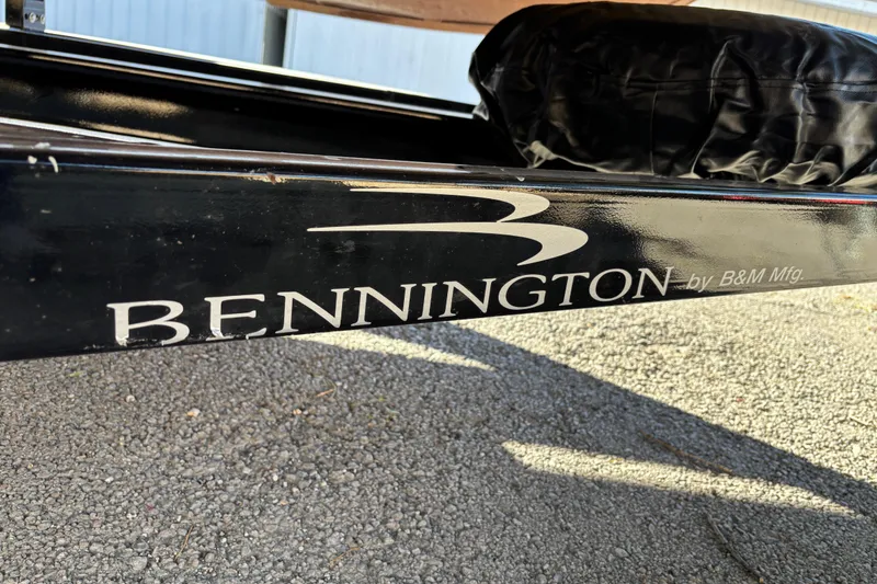 Slide: The Image of 2020 Bennington 21SF pontoon boat with Yamaha 90 outboard motor on trailer. - 4