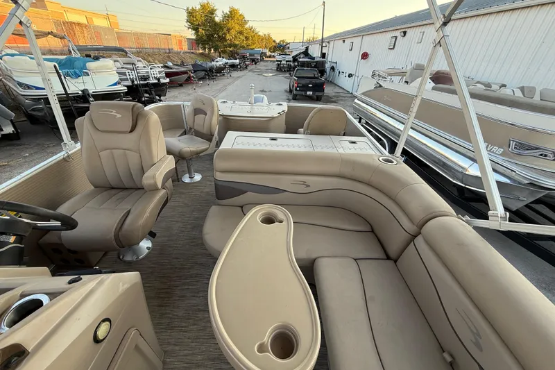 Slide: The Image of 2020 Bennington 21SF boat dashboard with steering wheel and control panel. - 44