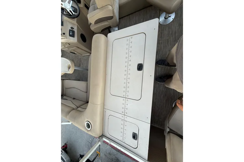 Slide: The Image of Empty storage compartment in a 2020 Bennington 21SF boat. - 55