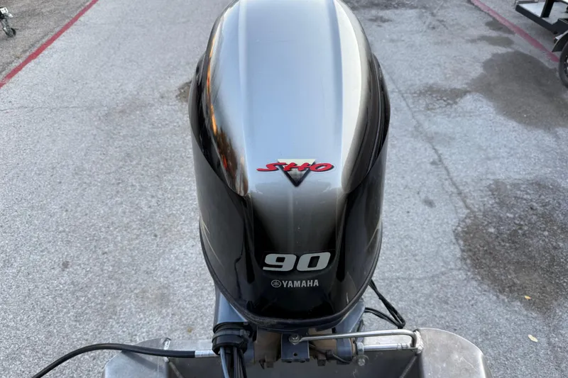 Slide: The Image of Battery compartment of a 2020 Bennington 21SF boat, showing wiring and connections. - 59