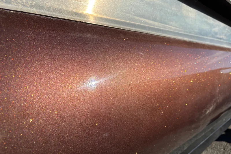 Slide: The Image of 2020 Bennington 21SF boat side panel with logo in sunlight. - 6