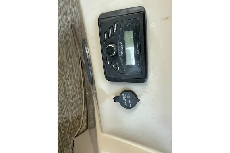 Slide: The Image of 2020 Bennington 21SF boat motor and propeller on a trailer. - 62